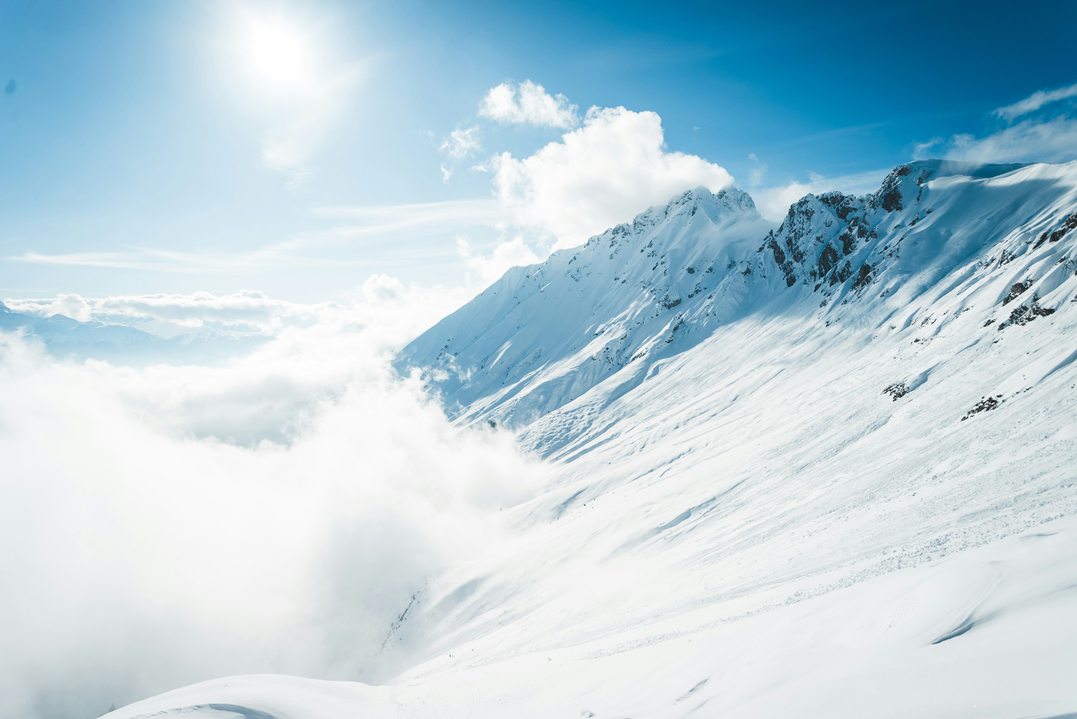 Powder skiing mountain backdrop